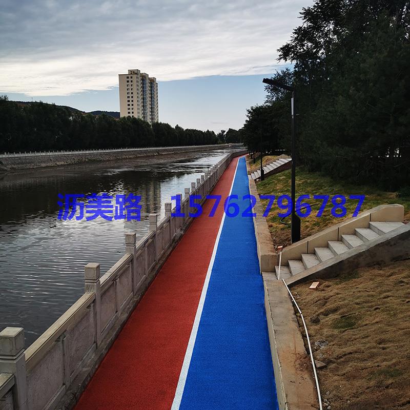 山西晋中河两侧人行路沥青改色